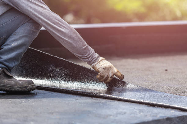 Professional Basement Waterproofing technician working in Nashville, IL